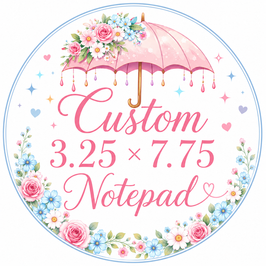 Decorative notepad with floral design and text on a white background