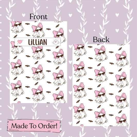 Composition Notebook design with a ghost wearing sunglasses and a pink bow, on a purple background with heart patterns.