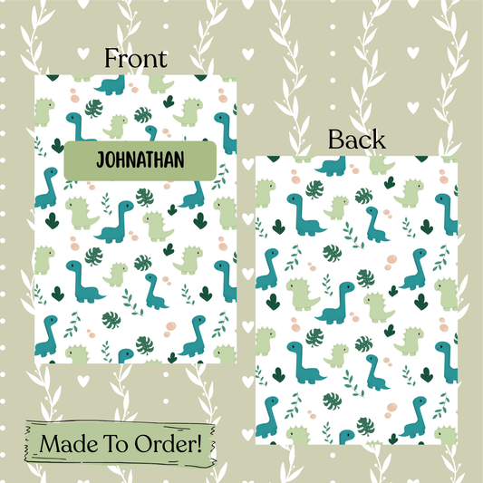 Dinosaur-themed stationery set with front and back designs on a beige background.