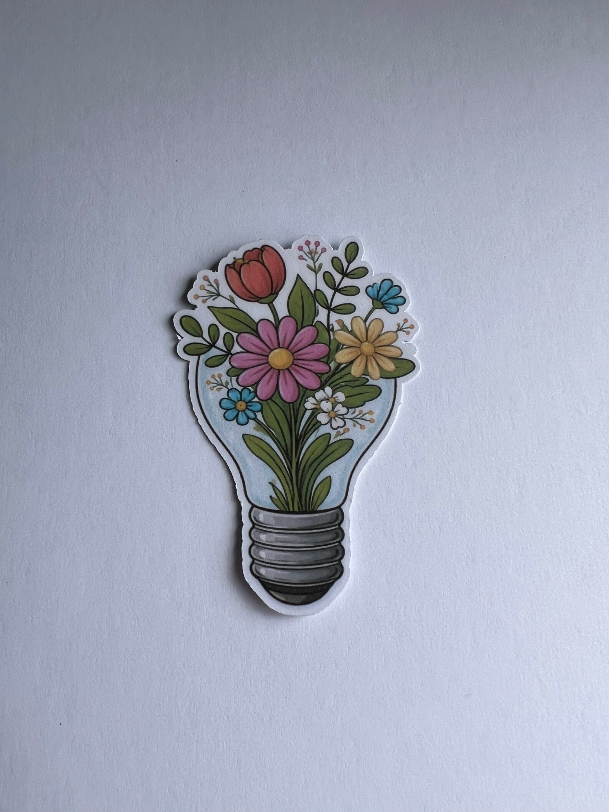Floral light bulb design sticker on a white background